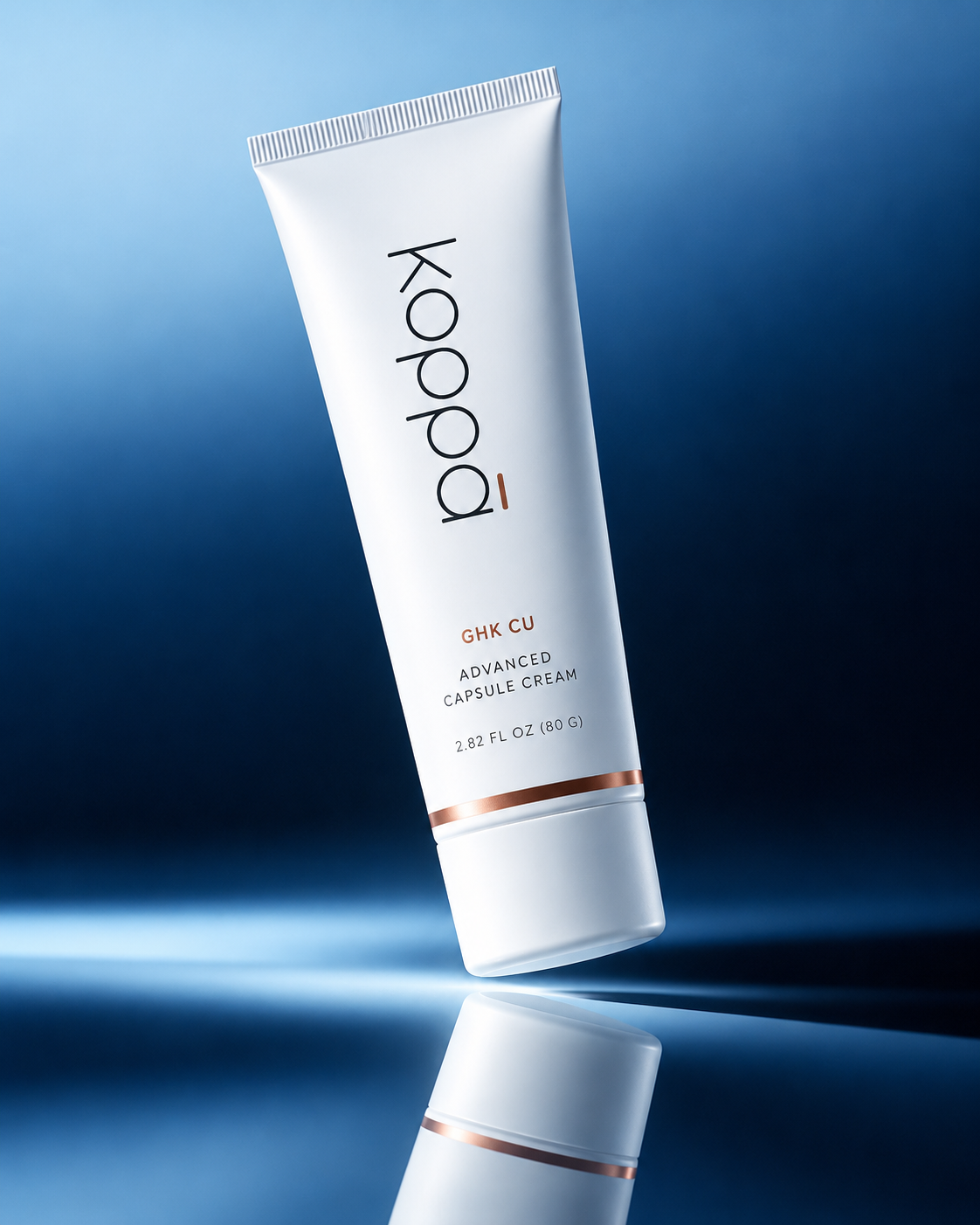Koppā Capsule Cream tube on a bright blue background
