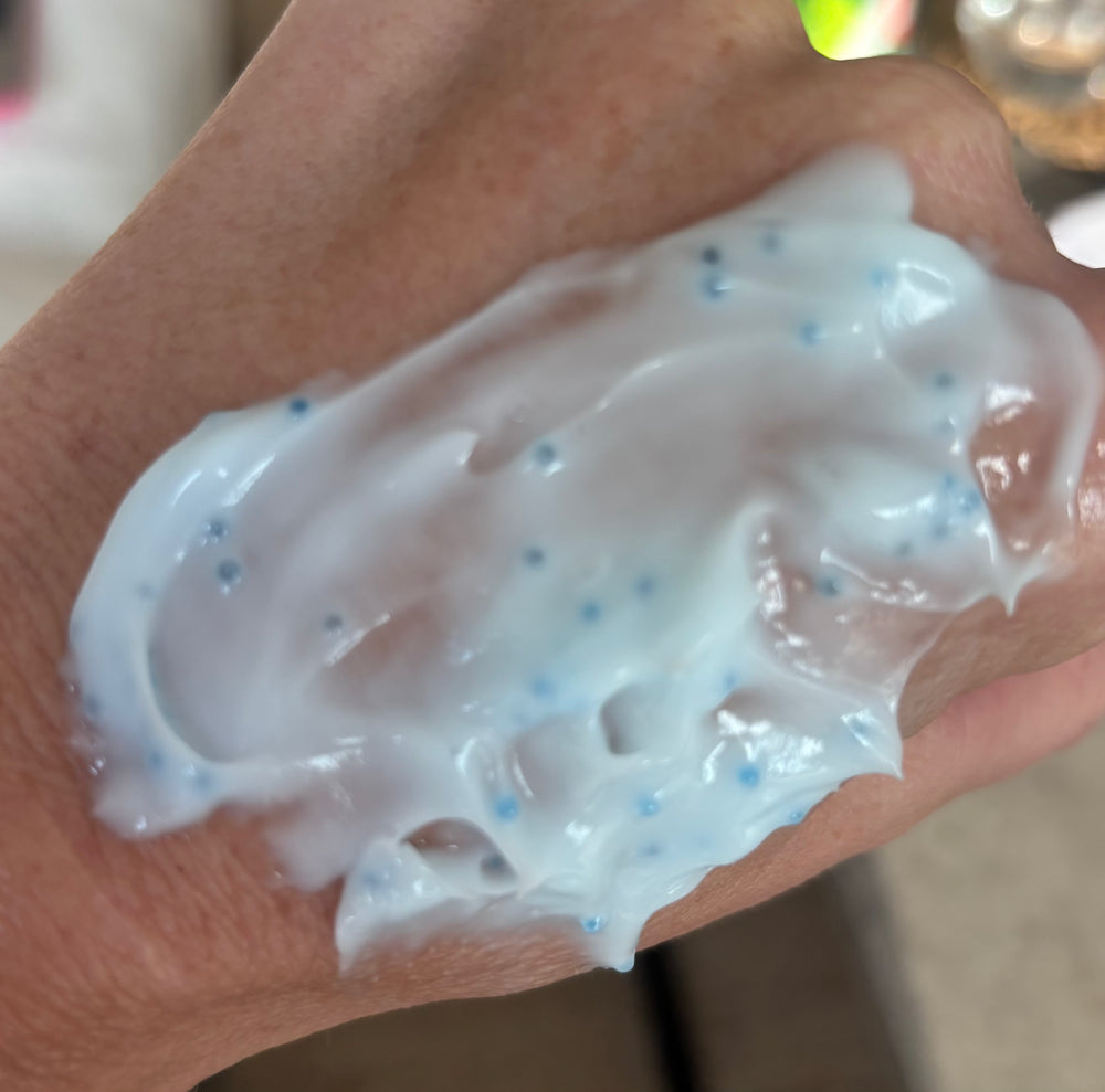 Farrah J- the cream actually has the capsules in it.  I find the cream super moisturizing, not sticky.