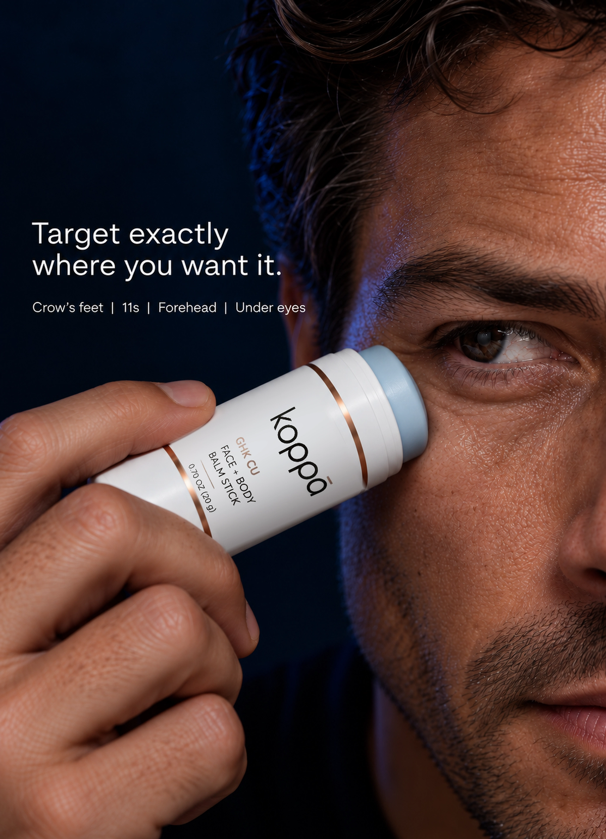 Man applying the Koppā GHK-Cu balm stick near the crow's-feet area