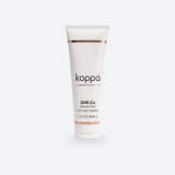 Koppā GHK-Cu Capsule Cream tube on a soft porcelain background