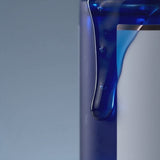 Koppā GHK-Cu 2% Serum being dispensed from its dropper — copper peptide serum texture