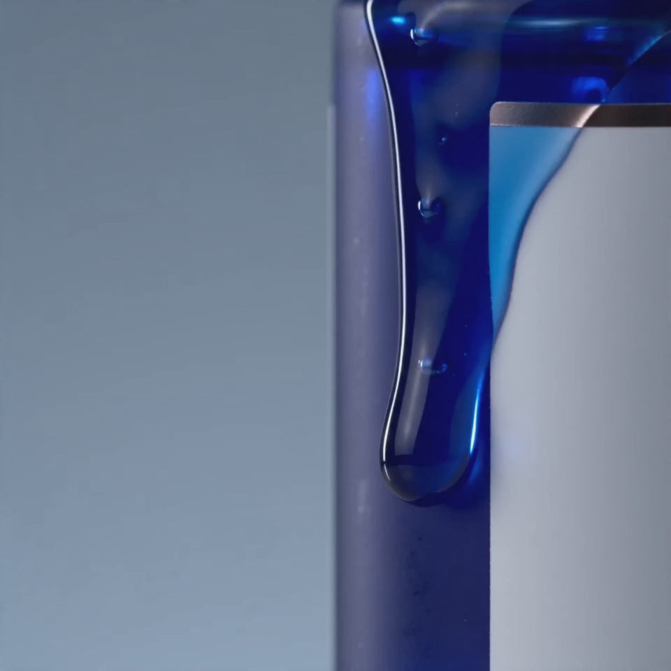 Koppā GHK-Cu 2% Serum being dispensed from its dropper — copper peptide serum texture