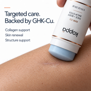 Pale blue tip of the GHK-Cu balm stick pressed to skin, leaving a sheer mark of copper peptide balm